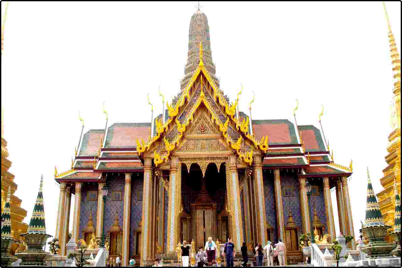 Wat Phra Kaew in Bangkok, Thailand, with its ornate golden spires and intricate temple architecture